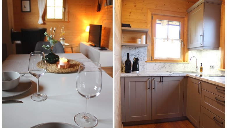 Cozy kitchen and dining area in a wooden house with modern furnishings and warm light.